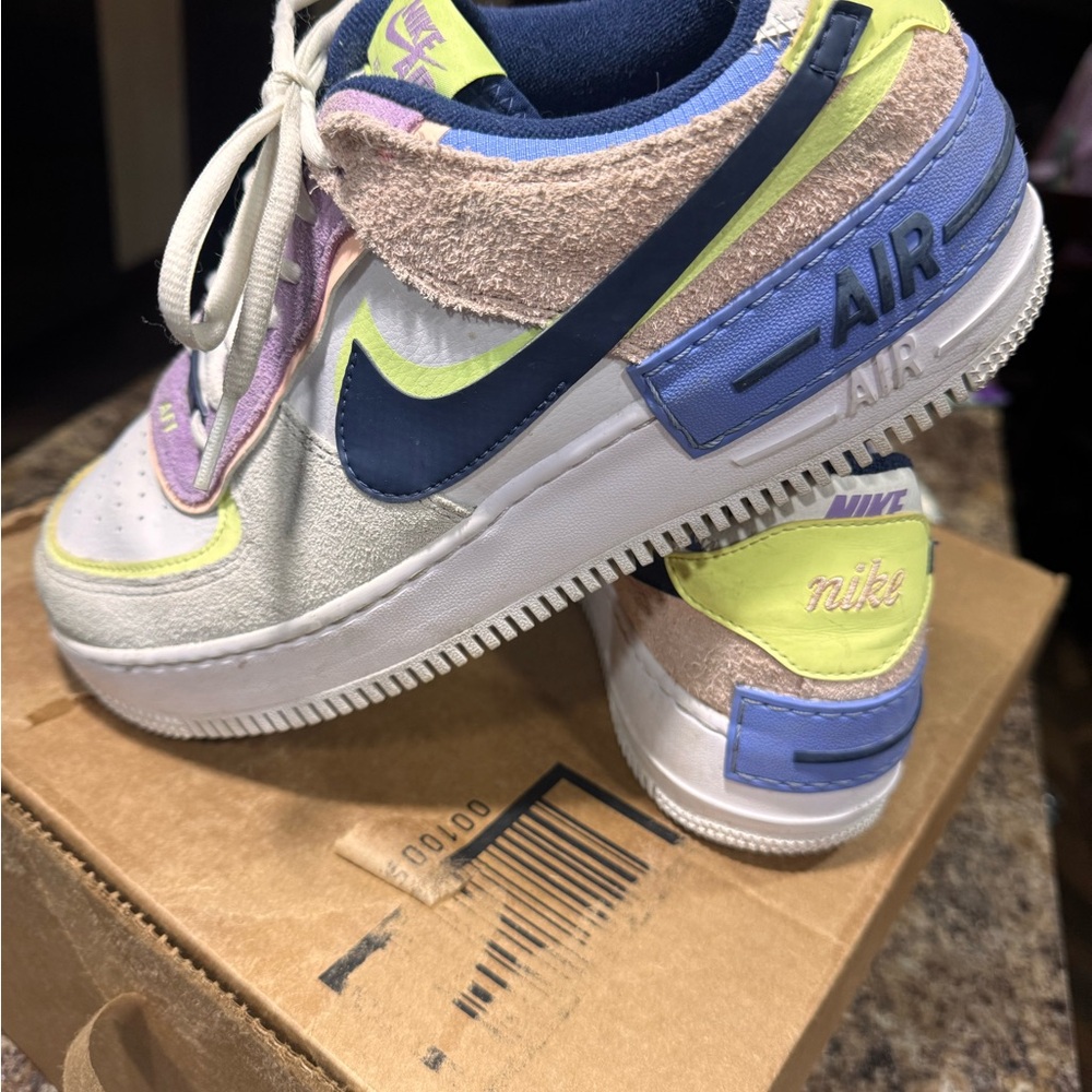 Nike Kids Sneakers in Blue, Yellow, and Purple